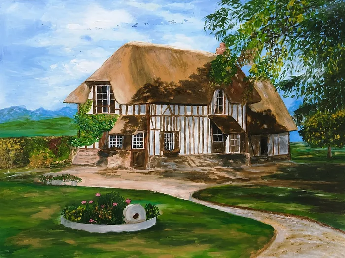 Une maison normande au centre d’un jardin arboré